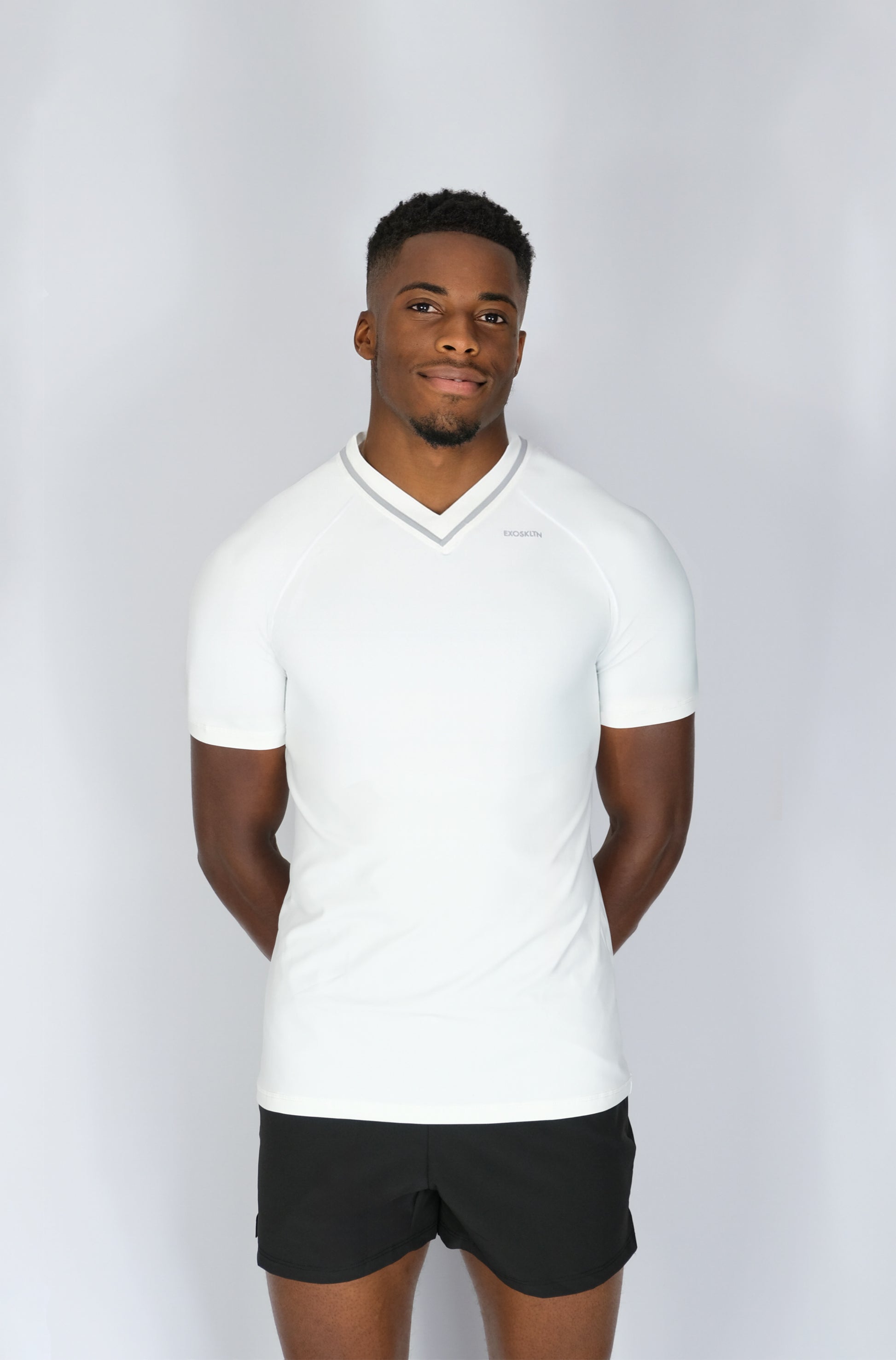EXOSKLTN MUSCLE FIT TOP WHITE